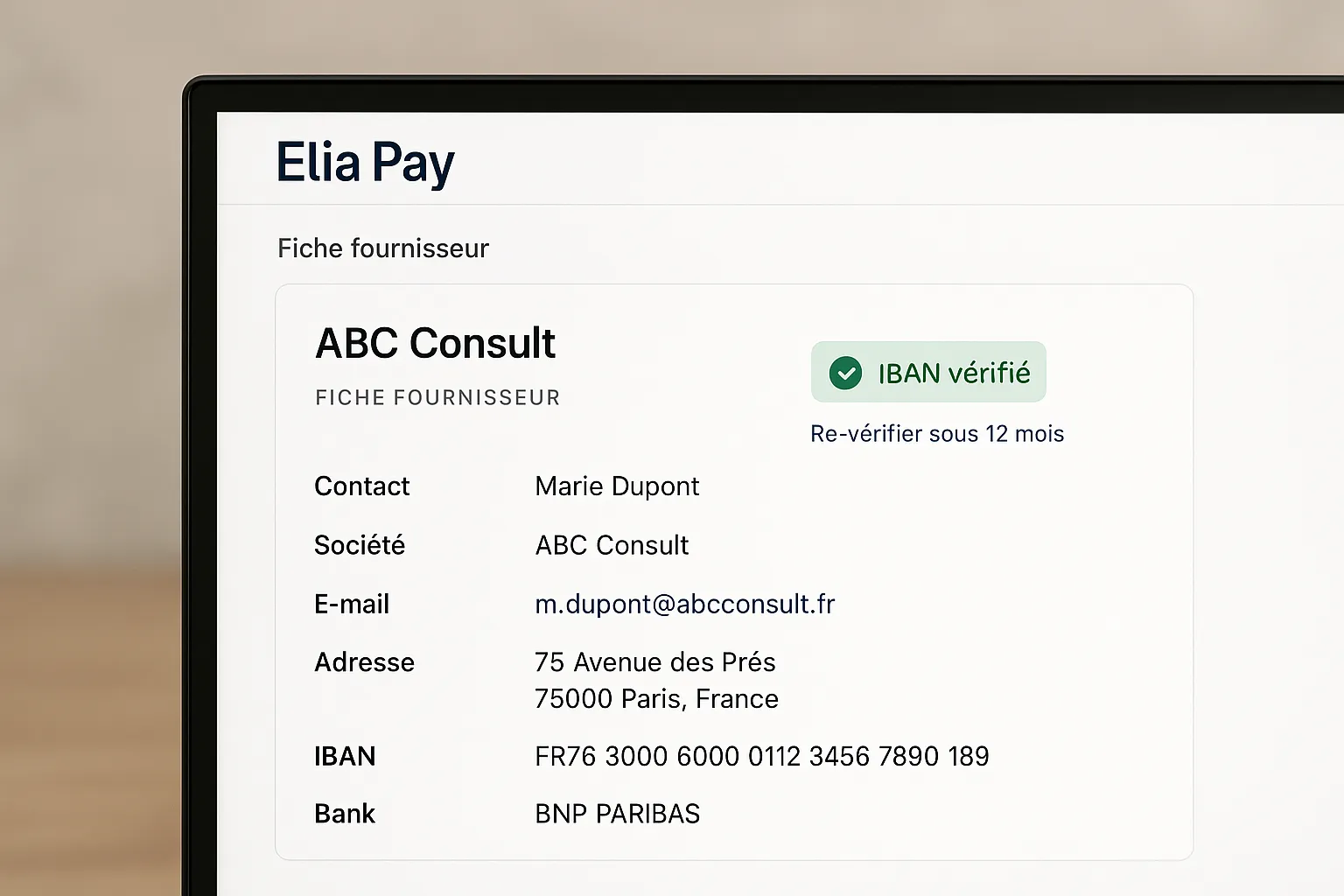 Interface Elia Pay affichant la fiche fournisseur avec un badge vert « IBAN vérifié » et un bouton pour re-vérifier sous 12 mois.